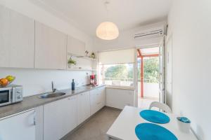 Kuchyňa alebo kuchynka v ubytovaní Apartments Keran