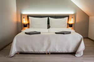 Postel nebo postele na pokoji v ubytování Apartmány Zámek - Vimperk