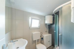 Kúpeľňa v ubytovaní Apartments Keran