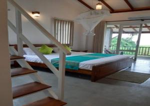 Krevet ili kreveti u jedinici u objektu Blue Sands Beach Resort