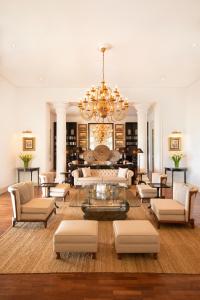 a large living room with a chandelier at W15 Hanthana Estate Kandy in Kandy