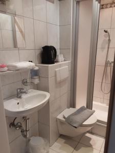 Kúpeľňa v ubytovaní Apartment House Seerose