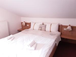 Voodi või voodid majutusasutuse Apartment House Seerose toas