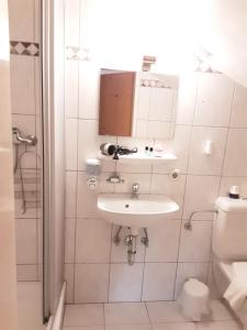 Kúpeľňa v ubytovaní Apartment House Seerose
