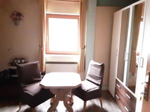 Posedenie v ubytovaní Apartment House Seerose