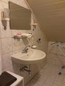 Kúpeľňa v ubytovaní Apartment House Seerose