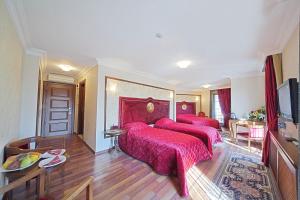 A bed or beds in a room at Antea Palace Hotel & Spa