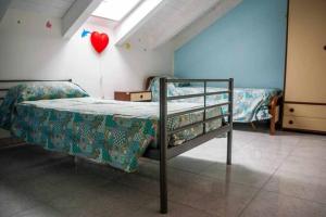 A bed or beds in a room at Appartamenti di Catia a due passi dal mare