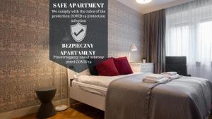Posteľ alebo postele v izbe v ubytovaní Apartment Nearto Old Town Daszyńskiego street
