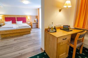 Ένα ή περισσότερα κρεβάτια σε δωμάτιο στο Landhaus Lauble +101 φωτογραφίες