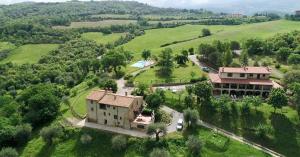 an aerial view of a house on a hill at Vitabella Toscana in Seggiano