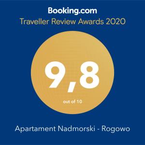 a yellow circle with the text travel review awards at Apartament Nadmorski - Rogowo in Rogowo