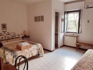 Postel nebo postele na pokoji v ubytování Pier Delle Vigne B&B