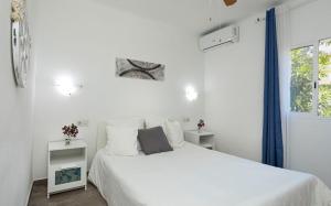 Ένα ή περισσότερα κρεβάτια σε δωμάτιο στο Casa Enriqueta +26 φωτογραφίες