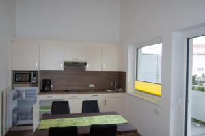 Kuchyňa alebo kuchynka v ubytovaní Ferienwohnung bei der Steinbergbahn
