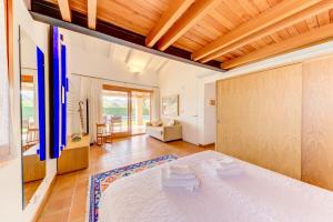Postel nebo postele na pokoji v ubytování Villa Camp Gran by Sealand Villas + 20 fotografií