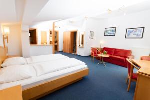 Bruggerhof - Camping, Restaurant, Hotel客房内的一张或多张床位