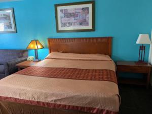 Letto o letti in una camera di Claridge Inn - St. George