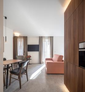 a living room with a couch and a table at Lisbon Serviced Apartments - Avenida in Lisbon