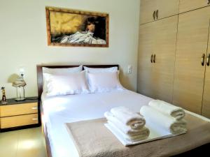 Postel nebo postele na pokoji v ubytování Pelion Seaside Luxury House