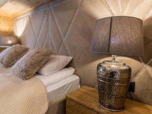Postel nebo postele na pokoji v ubytování POD SKOCZNIA SPA Zakopane