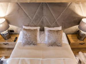 Postel nebo postele na pokoji v ubytování POD SKOCZNIA SPA Zakopane