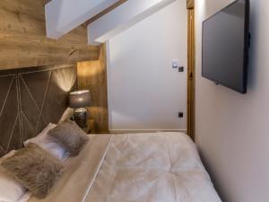 Postel nebo postele na pokoji v ubytování POD SKOCZNIA SPA Zakopane