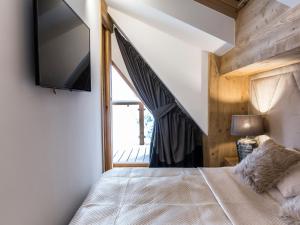 Postel nebo postele na pokoji v ubytování POD SKOCZNIA SPA Zakopane