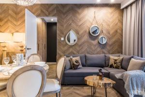 Posezení v ubytování POD SKOCZNIA SPA Zakopane