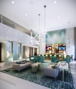 a rendering of the lobby of a hotel at Wyndham Garden Miami International Airport in Miami