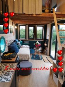 Posezení v ubytování Ô p'tit nid Milie