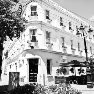 a black and white photo of a building at Middle Park Hotel in Melbourne