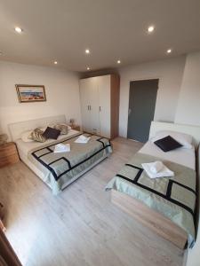 Postel nebo postele na pokoji v ubytování Villa Brasina