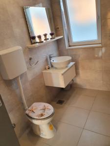 Koupelna v ubytování Villa Brasina