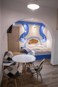 Säng eller sängar i ett rum på Alta Vista Naxos