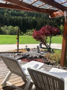 Zahrada ubytování Ferienhäuser Familie Hofer Stockenboi Weissensee