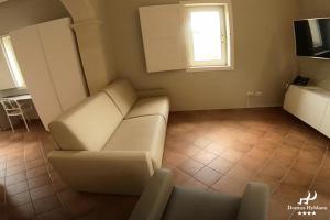 TV a/nebo společenská místnost v ubytování Domus Hyblaea Resort