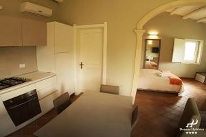 Kuchyň nebo kuchyňský kout v ubytování Domus Hyblaea Resort