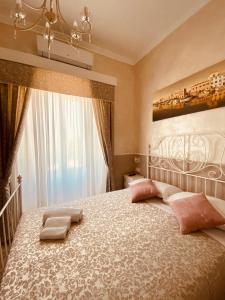 Tempat tidur dalam kamar di Domus Valadier B&B Guesthouse