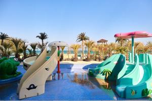 a water park with a slide and a water slide at Sea Love apt SPA n Pools Beach Resort in Mamaia Nord