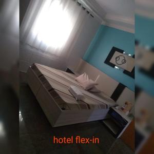 Letto o letti in una camera di Hotel Flex In