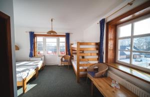 Postel nebo postele na pokoji v ubytování Hotel Večernice