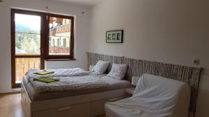 Posteľ alebo postele v izbe v ubytovaní Apartmány 33 a 8 AD Kamzík Donovaly