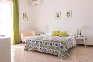 Katil atau katil-katil dalam bilik di La Villa dei Limoni - Villa Panoramic with Pool