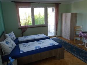 Łóżko lub łóżka w pokoju w obiekcie Smx Apartement