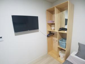 TV a/nebo společenská místnost v ubytování Yong Stay