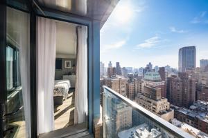 a view through a window of a building with a view of a city at Pestana Park Avenue in New York