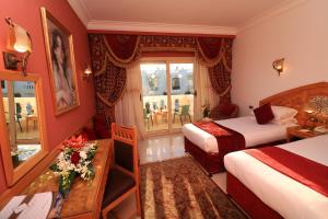 Кровать или кровати в номере Oriental Rivoli Hotel & Spa