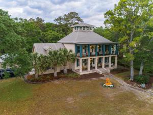 a large house with a tower on top of it at LaPolena Bed & Breakfast in Southport