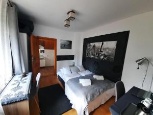 Postel nebo postele na pokoji v ubytování Pokoje Gościnne KAMI